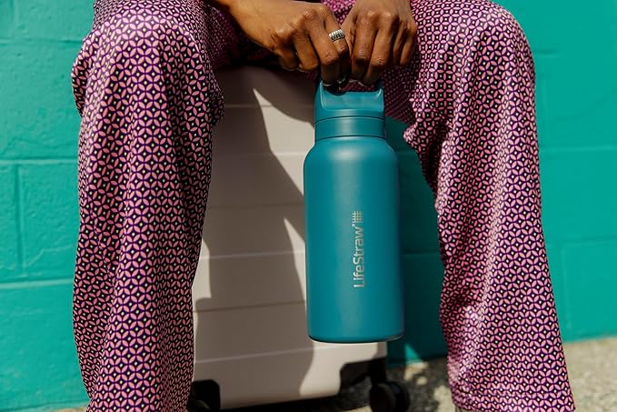 LifeStraw Go Series — Insulated Stainless Steel Water Filter Bottle for Travel and Everyday Use Removes Bacteria, Parasites and Microplastics, Improves Taste, 1L Laguna Teal