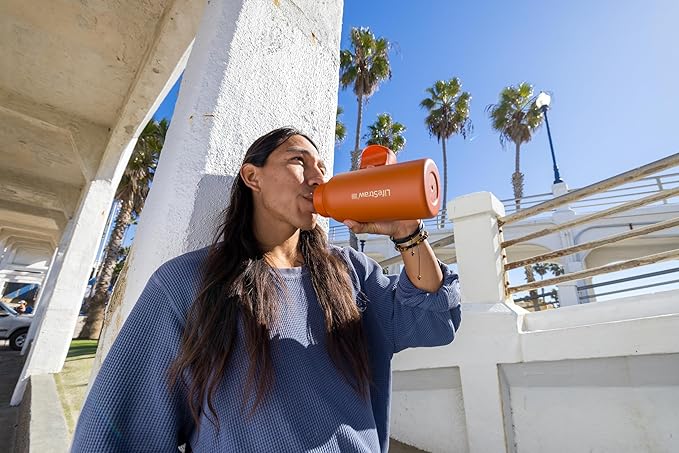 LifeStraw Go Series — Insulated Stainless Steel Water Filter Bottle for Travel and Everyday Use Removes Bacteria, Parasites and Microplastics, Improves Taste, 1L Kyoto Orange
