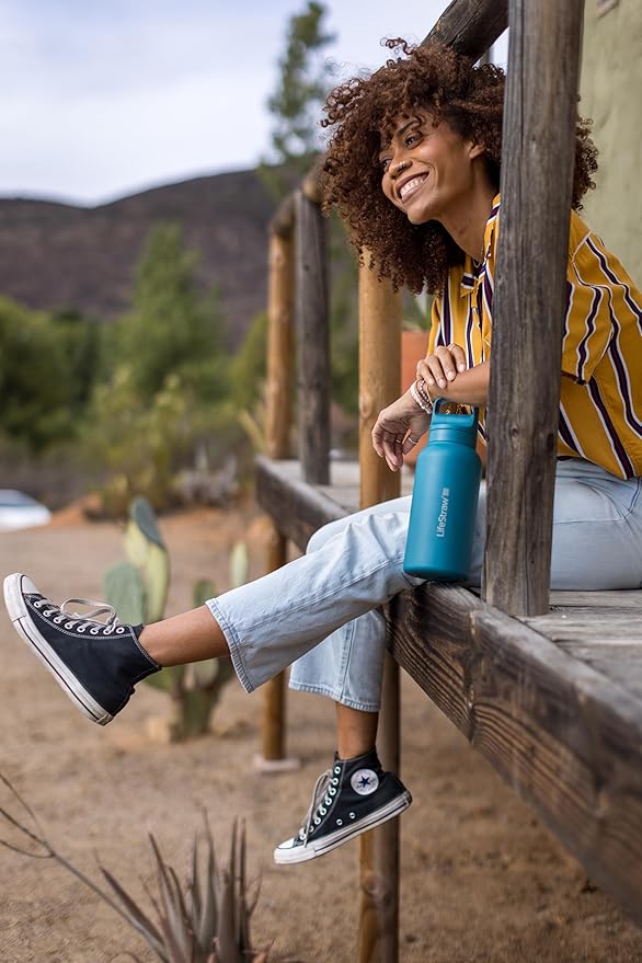 LifeStraw Go Series – Insulated Stainless Steel Water Filter Bottle for Travel and Everyday Use, Removes Bacteria, Parasites and Microplastics, Improves Taste, 1L Thistle Purple