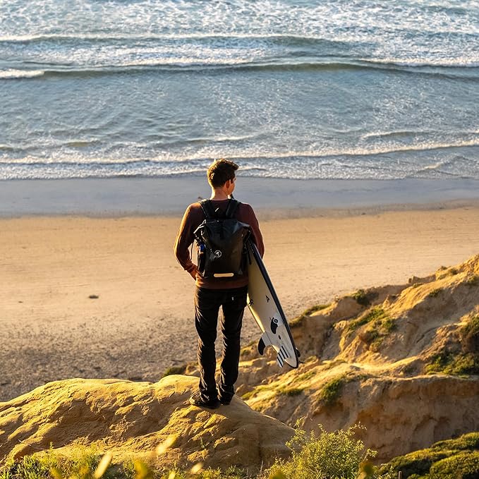 Ho Stevie! Waterproof Surf Backpack - Heavy Duty with Laptop Sleeve - Roll Top Closure Keeps Your Gear Dry In Bag - 25L